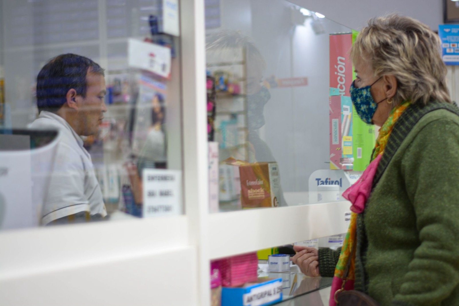 Customer asking questions at a Michigan dispensary counter