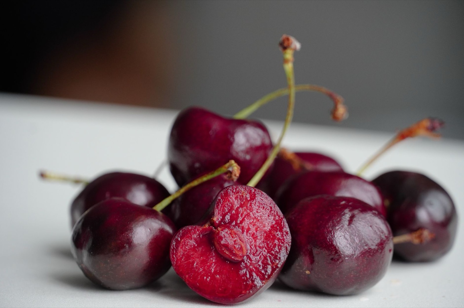 Stone fruit and berries underneath the grape candy note